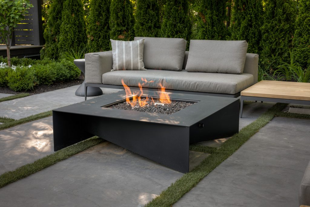 Fire Pit Ideas | 48-inch square fire pit in the middle of a patio